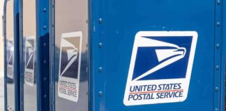 Trump’s USPS Changes Stir Democratic Worries: Is Privatization Imminent? Blue USPS mail collection boxes in a row.