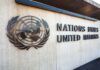 United Nations sign and emblem on building wall