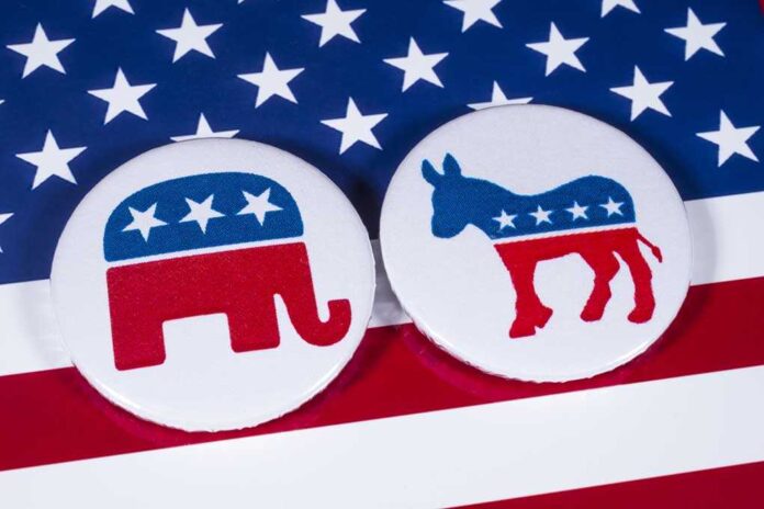 786450256 featured image Republican and Democrat symbols on American flag.