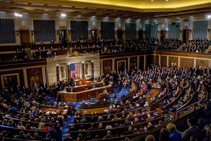 1186368274 featured image Legislative chamber filled with people during a session
