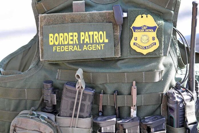 1646704639 featured image Border Patrol vest with gear and communication equipment.