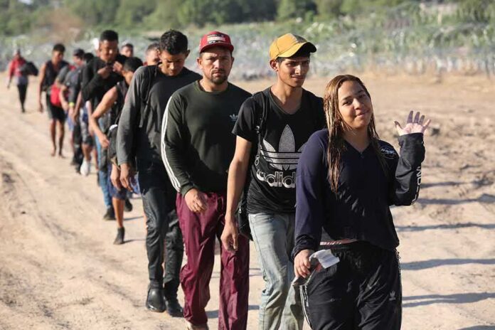 2364873693 featured image Line of people walking on a dirt road