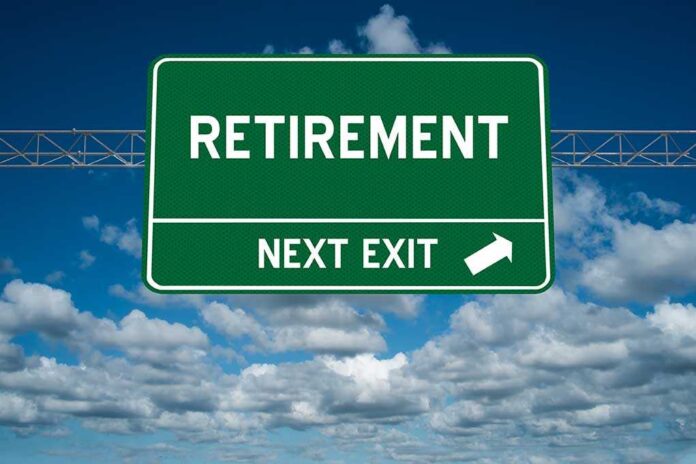 583127620 featured image Green road sign reading retirement next exit sky background
