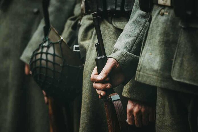 1340357660 featured image Soldiers in uniform holding rifles and grenades