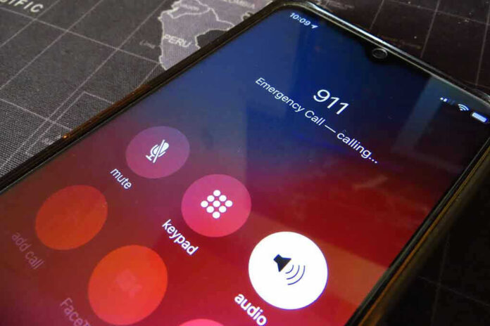 2326378557 Phone screen showing 911 emergency call in progress