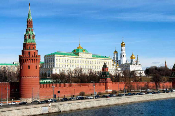 545507668 The Kremlin's towers and cathedrals beside a river