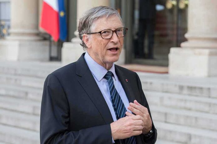 Bill Gates speaking outdoors at an event