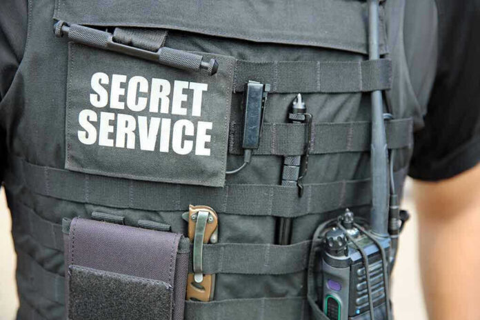 Secret Service vest with various tactical gear attached.
