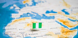 Flag pin marking Nigeria on Africa map