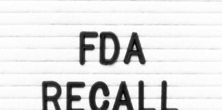 RED ALERT: Tylenol and Advil Laced with Rodent Feces FDA Recall written on letter board.