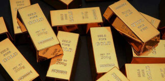 Fort Knox Secrets — Broken Seals! Gold bars stacked on dark background