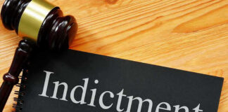 Emmy Winner INDICTED — Child Actor Allegations EXPLODE Gavel next to indictment document on wooden table.