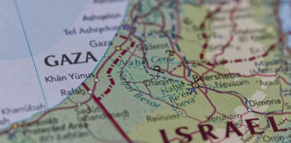 Border Bottleneck: Only 50 Pass Daily Map showing Gaza Strip and parts of Israel.