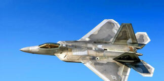 $4.5B Bombshell Fuels Stealth Bomber Surge Fighter jet in flight against a clear blue sky.