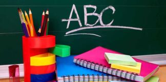 Second-Grader Fires Handgun In Class A collection of colorful school supplies including notebooks, pens, and scissors on a desk