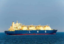 $100 OIL SPIKE: 16 Million Barrels Trapped LNG tanker ship sailing on open sea.