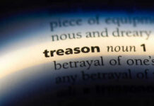 The word treason highlighted in a dictionary.