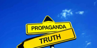 Yellow signs: Propaganda left, Truth right. Blue sky background.