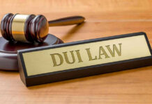 Gavel and DUI Law nameplate on desk.