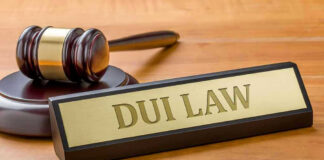 Gavel and DUI Law nameplate on desk.