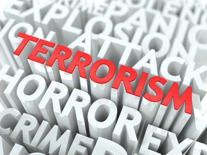 The word TERRORISM in bold red letters surrounded by related terms in white
