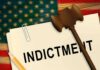 A legal document labeled 'INDICTMENT' with a gavel and pencil