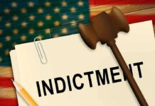 A legal document labeled 'INDICTMENT' with a gavel and pencil