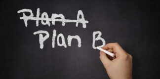 Vehicle MASSACRE PLOT Shocks Synagogue A hand writing Plan B on a chalkboard with Plan A crossed out