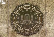 Bald Eagle Killer Faces Federal Hammer FBI seal on a marble wall.