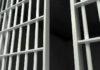 FORMER PM’S Unbelievable Prison RELEASE Close-up of prison cell bars.