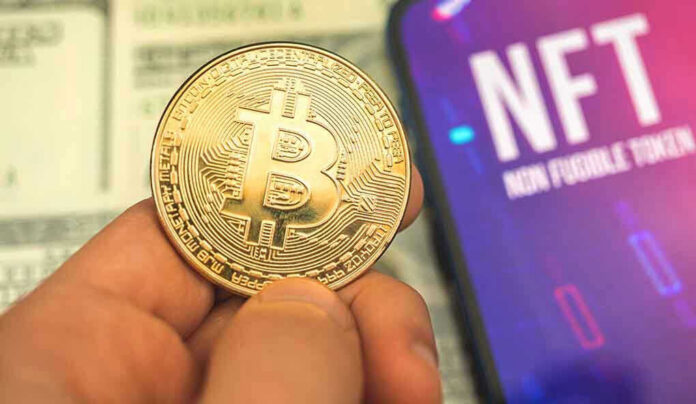 Bitcoin Person holding Bitcoin coin, NFT text on screen.