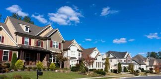 Texas Judge ORDERS New MUSLIM Community to be BUILT A row of modern suburban houses under a clear blue sky