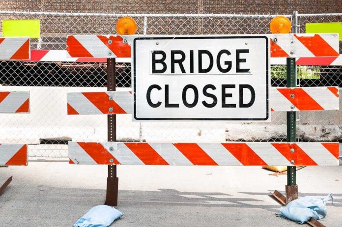 Bridge,Closed,Sign A Bridge Closed sign surrounded by safety barriers and fencing