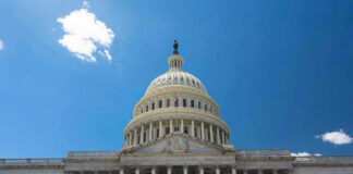 “No-Pay Congress” Plan Seeks to End Career Politics U.S. Capitol building against a clear blue sky.
