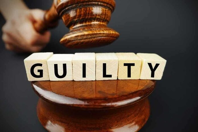 shutterstock_1014820045-1- A gavel above wooden blocks spelling 'GUILTY'
