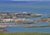 Kharg Island Exposes Ground War Limits Aerial view of a coastal landscape featuring waterways and islands