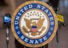 Senate Advances Border Funding Plan Official seal of the United States Senate with microphones in the background