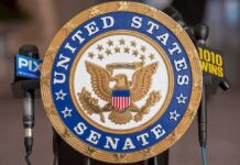 Senate Advances Border Funding Plan Official seal of the United States Senate with microphones in the background