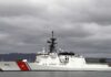 U.S. Helicopter Down Near Iran, Trump Blames Attack A U.S. Coast Guard ship docked under cloudy skies