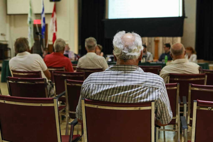 1521587657 People attending a meeting in a conference room.