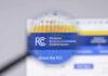 Luxury Seats. Billion-Dollar Decisions. Same Company. Federal Communications Commission website magnified on browser.