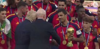 Trump booed at World Cup as he presents Spain FIFA trophy, then lingers for lifting ceremony