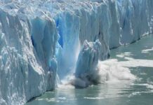 Melting Edge Mission Risks It All A glacier calving into the ocean, creating a splash of ice and water
