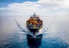 Container ship sailing on calm ocean