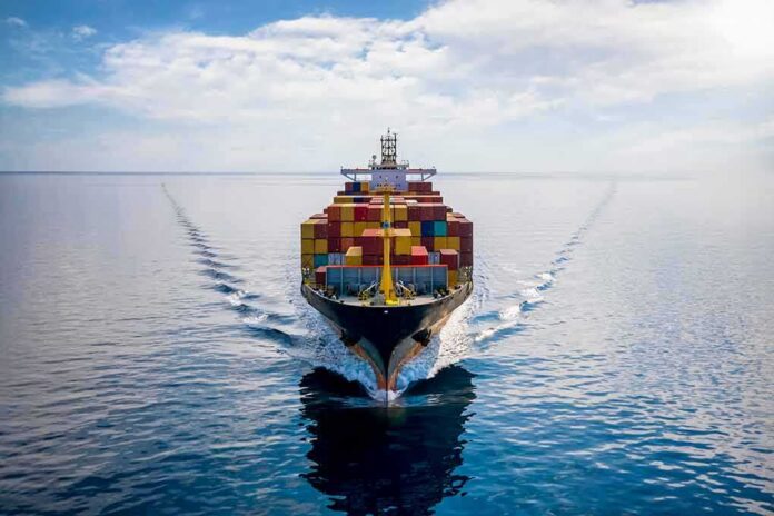 shutterstock_1848489349 Container ship sailing on calm ocean