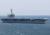 Navy’s Big Drone Promise Slips to 2029 Aircraft carrier sailing at sea