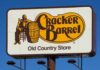 Tradition Wins: Cracker Barrel CEO Out Following Brand Shake-Up Cracker Barrel roadside sign with logo against blue sky