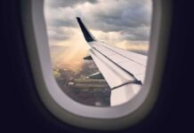 The Secret Spy Plane Hidden From America for 14 Years airplane wing seen from window during descent