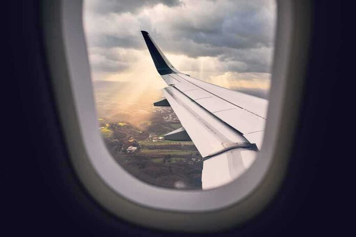 airplane wing seen from window during descent