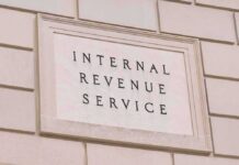 Milwaukee County Tax Hike Sparks Blame Game Internal Revenue Service building sign on a stone wall